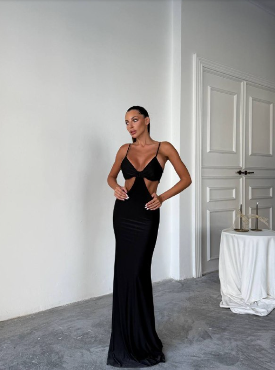 Cut to Perfection: Sleek Black Cutout Dress